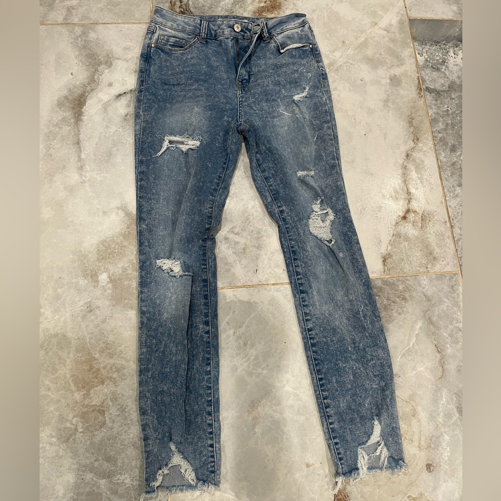 Blue Skinny Jeans with Distressed Details